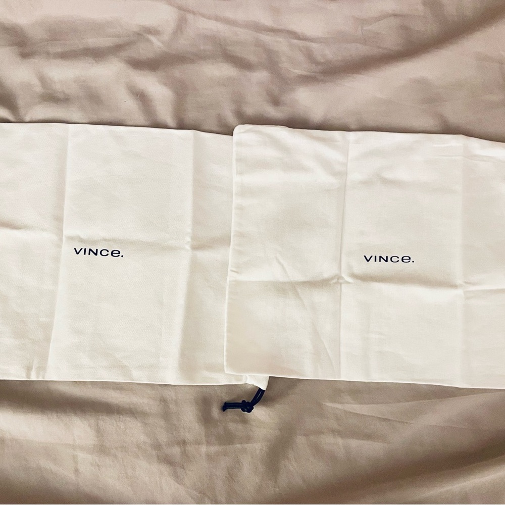 Pair of vince. Dustbags